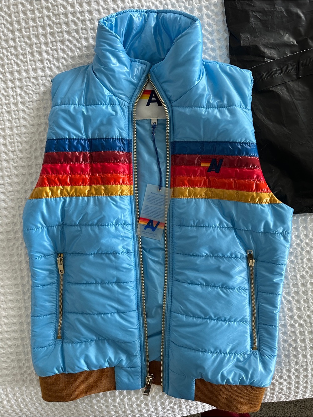 Aviator Nation Sky Blue Puffer Vest with 5 Stripe ($400)